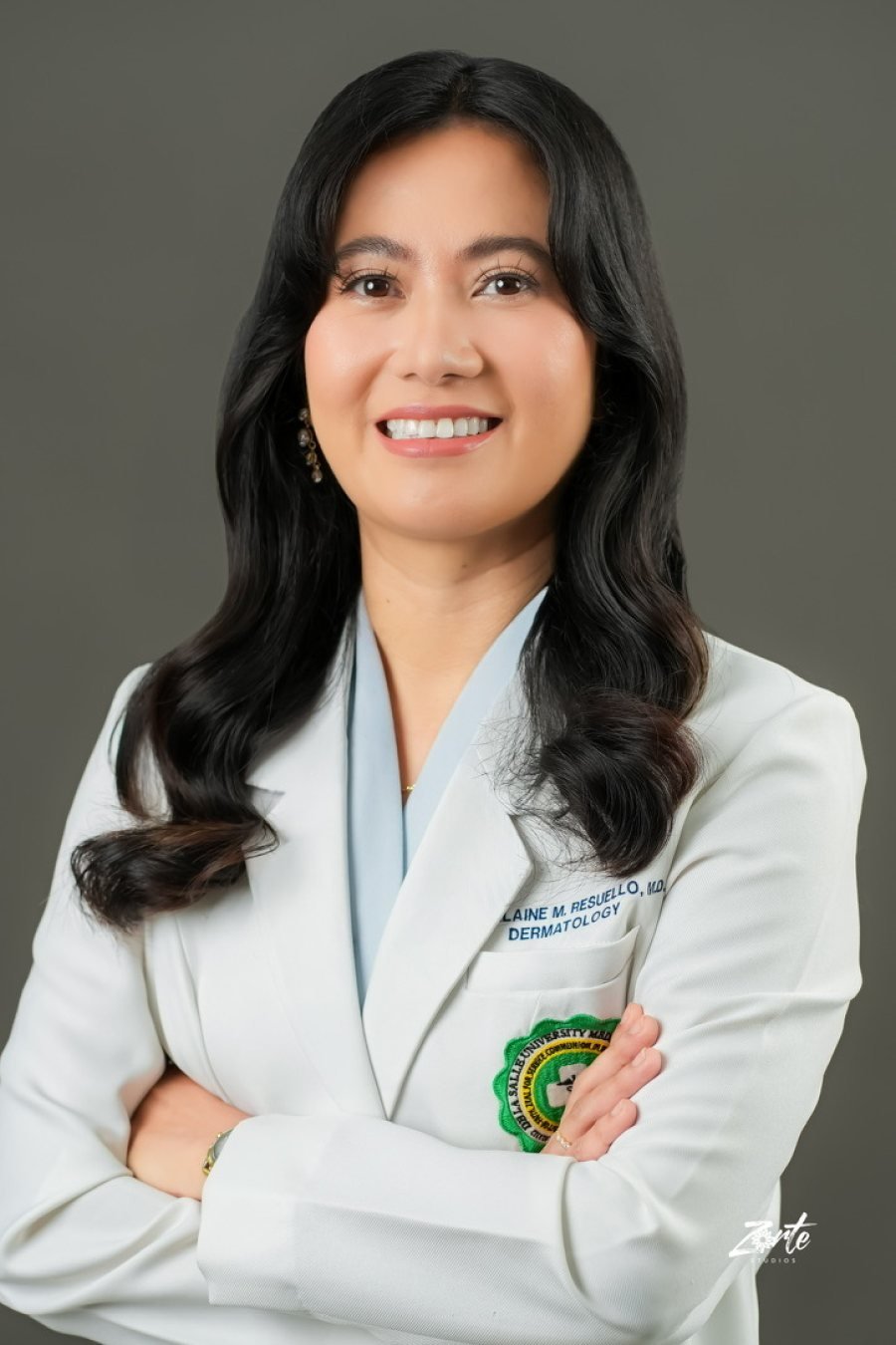 Dr. Tina Elaine M. Resuello, M.D., FPDS, dermatologist at Skinique